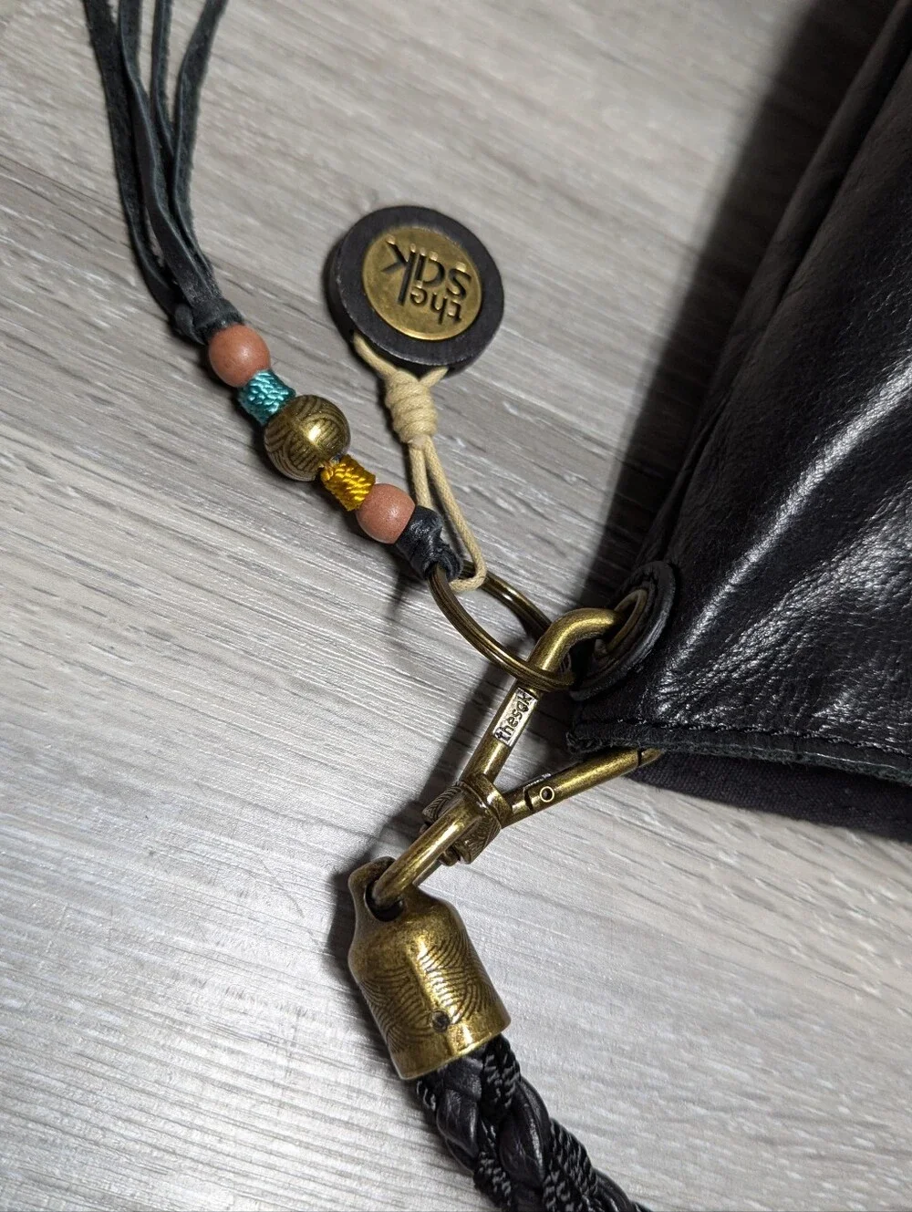 The Sak Black Shiny Leather Hobo Bag Braided Shoulder Strap
